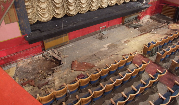The distressed and dilapidated looking stalls and auditorium of Hyde Theatre Royal
