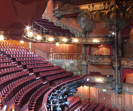 Auditorium seating in the London Lyceum Theatre viewed from the side.