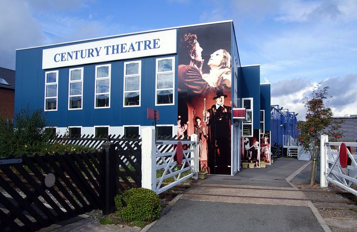 The blue exterior of the Century Theatre.