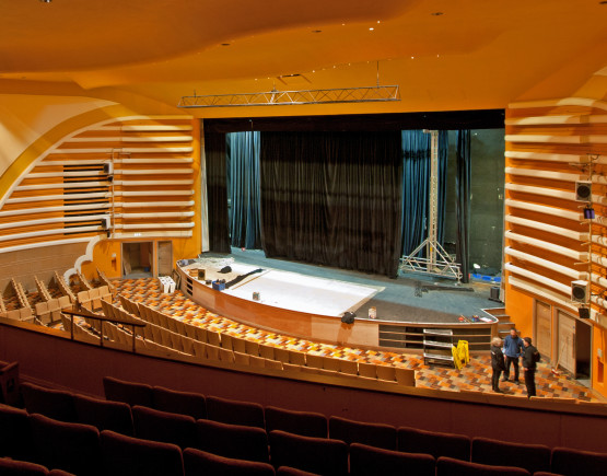 The vast Art Deco auditorium or Peterborough  Broadway, in oranges, blacks and whites.