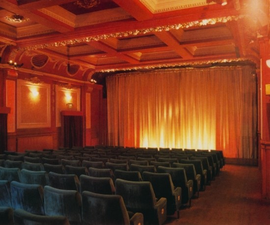 Small theatre auditorium with rows of seats at The Gate