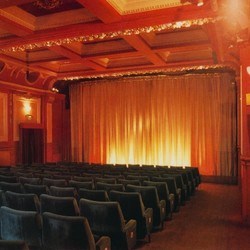 Small theatre auditorium with rows of seats at The Gate