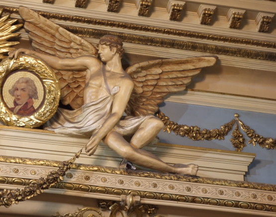 The header detail at the top of the proscenium at Wyndham's Theatre London.