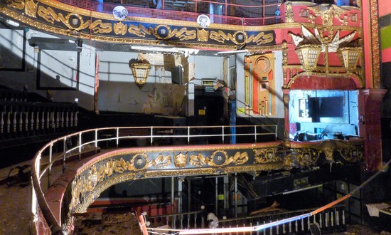 A side view of the Plymouth Palace auditorium with its red and black nautical theme