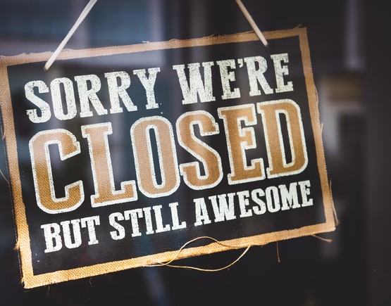 Door sign with the words 'Sorry we are closed but we are still awesome'