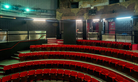 Semi circular seating  in the auditorium of the Roundhouse. 