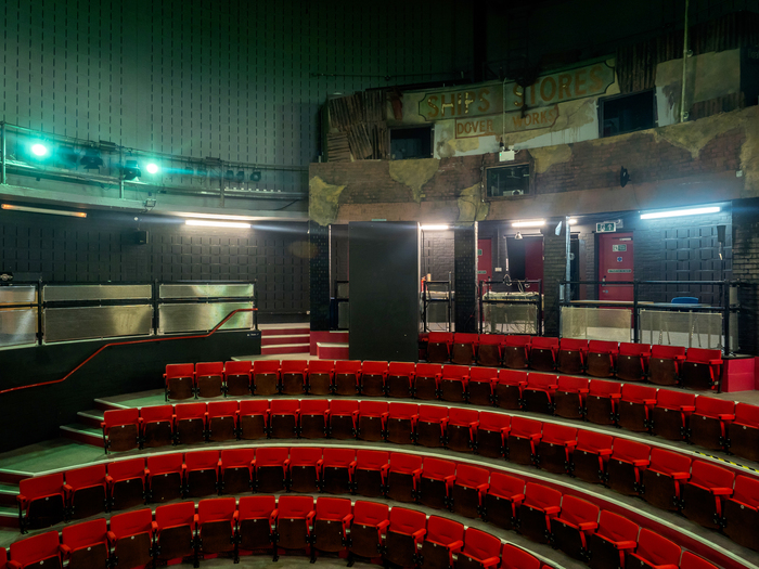 Semi circular seating  in the auditorium of the Roundhouse. 