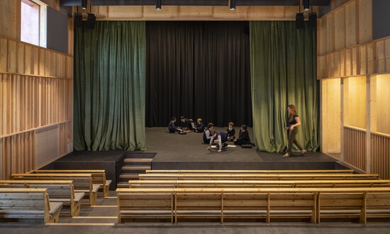 Students sitting in the new David BrownlowTheatre auditorium.