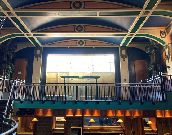 Interior of historic theatre Walsall Imperial, looking towards the proscenium arch.