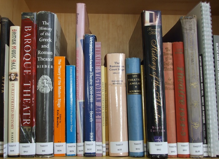 Close up of book splines from books in Theatres Trust Library