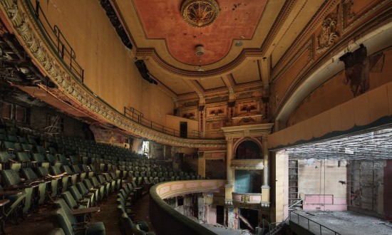 Colour auditorium photo from the first balcony looking across to the opposite side boxes and up to the ceiling. 