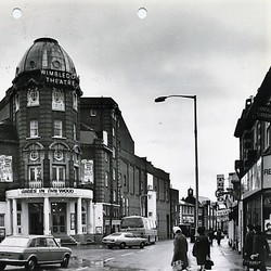 Wimbledon Theatre exterior with sign for Babes in the Woods