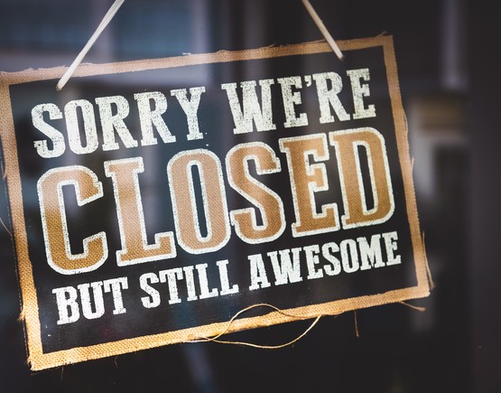 Door sign with the words 'Sorry we are closed but we are still awesome'