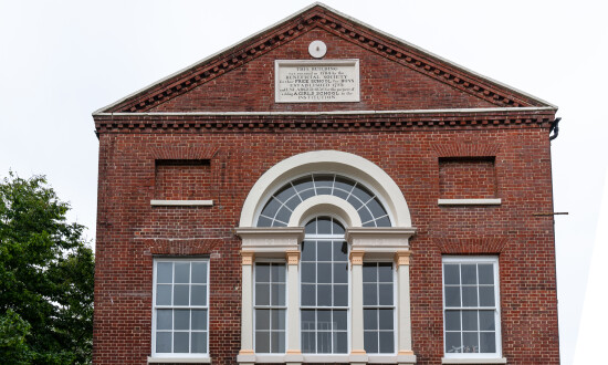 A façade of the theatre, showing the upper floor window.