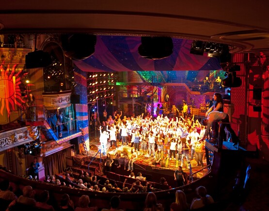 West End production of Hair with a busy audience