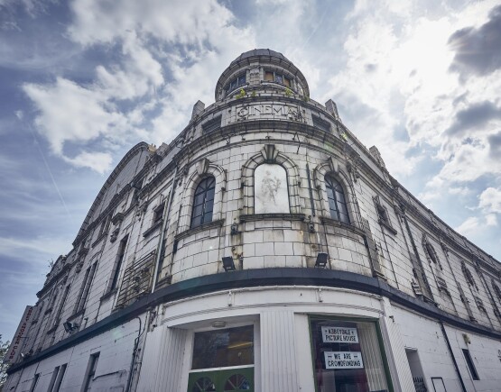 Exterior of Abbeydale Picture House, a large white building with a flytower.